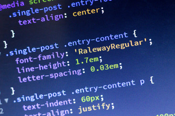 Web development code: CSS/LESS styles preprocessor script lines. Abstract screen of web developer.