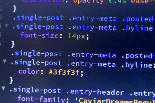 Web development code: CSS/LESS styles preprocessor script lines. Abstract screen of web developer.