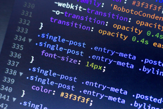 Web development code: CSS/LESS styles preprocessor script lines. Abstract screen of web developer.