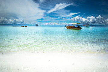 Boats at beach, Philippines © Magdalena