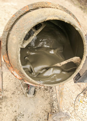 Mixing of concrete in a concrete mixer
