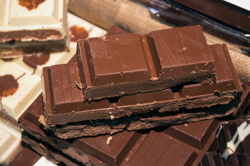 closeup of plain chocolate pile in luxurious chocolate store
