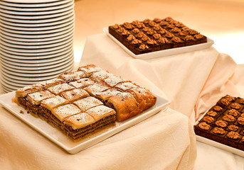 Baklava, traditional oriental sweet round pastry cookies with nuts in an restaurant  display