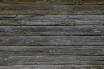 Obraz premium surface of a wooden house wall of old logs