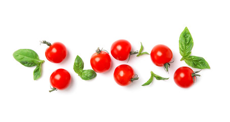 Fresh green basil leaves and cherry tomatoes on white background, top view