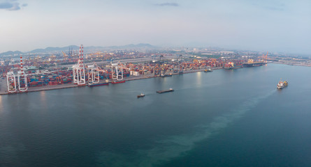 Aerail view of cargo container ship in the cargo international yard port .