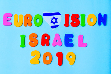 Text : Eurovision Israel 2019 with flag Israel Magen David Star heat shape on blue background. Eurovision Song Contest May 2019 In Tel Aviv.
