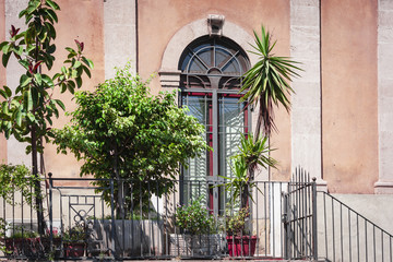 View on street of Catania, Sicily, Italy  - facade of an ancient building
