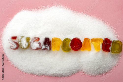 "Sugar coated facts and white lies concept with the word SUGARCOATED