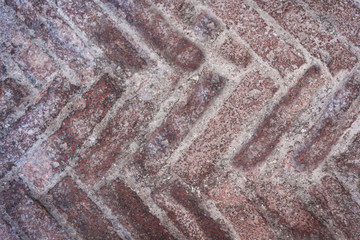 Stone texture – floor with multi-colored slabs background in yard of ancient building in Catania, Sicily
