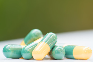 Pain killer capsules called "Tramadol HCL" on white background.Tramadol HCL 50 mg