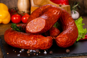 Pork sausages over wooden