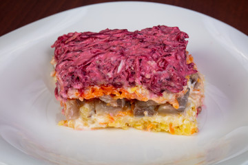 Russian salad with herring and beetroot