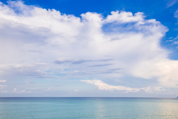 Fototapeta na wymiar Idyllic seascape background with blue sky cloud