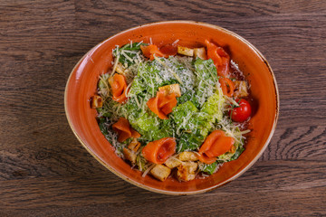Caesar salad with salmon