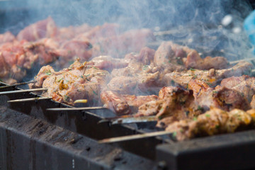 grilled delicious meat on skewers, smoked barbecue