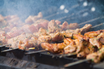 grilled delicious meat on skewers, smoked barbecue