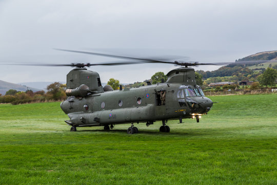 An Royal Air Force CH-47-HC.6A Chinook helicopter lifts into the air to return to base after a bird strike during low level flying in the Peak District on 11 October 2018.