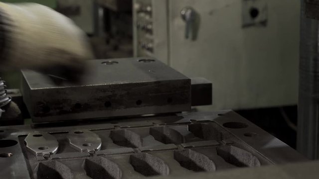 Hands Of The Worker Lay The Auto Parts