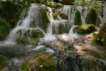 Fototapeta na wymiar Little waterfalls in Plitvice National Park, Croatia
