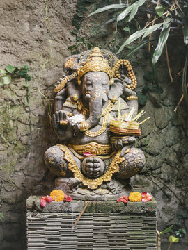 Stone statue of oriental ritual