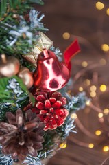Happy new year and Merry Christmas concept. Christmas tree with new year decoration and bokeh on the wooden background.
