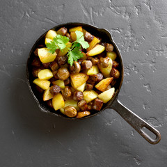 Fried potatoes with mushroom and sausage