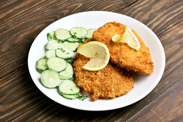 Schnitzel with cucumber salad