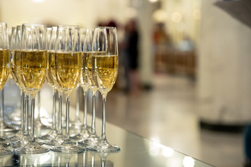 Glasses of sparkling wine on the table