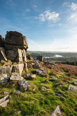 Stunning Autumn sunset landscape image of view from Leather Tor towards Burrator Reservoir in Dartmoor National Park