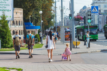 people walking on city street