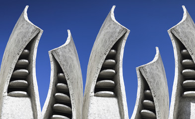 Abstract urbanistic background. Architecture, sculptures and shapes