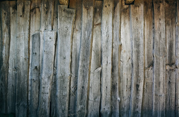 Old vintage wooden planks of the house. Grey wood texture background.