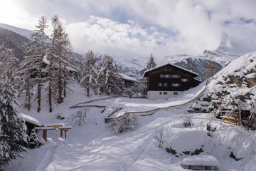 mountain houses at cold winter day