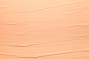 BB CC foundation smudged cream background