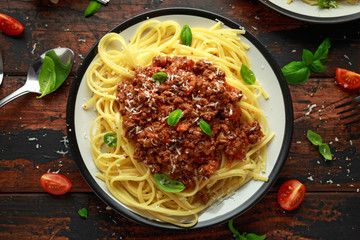 Italian pasta bolognese with beef, basil and parmesan cheese