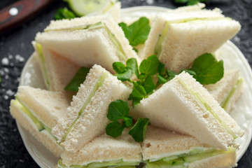 Cucumber sandwiches with soft cheese, sea salt and water cress for tea party