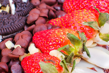 Delicious homemade brownie cake with strawberries. Selective focus