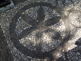 Decorative pebble mosaic in Granada square