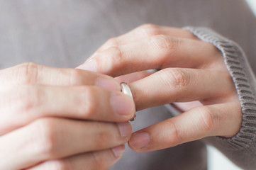 Fototapeta premium Close up of hands of a man wearing a ring 