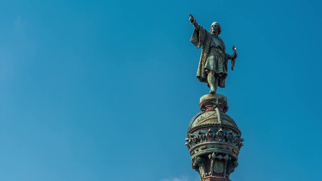 Columbus Monument in Barcelona. Bronze statue represents Christopher Columbus pointing towards the New World with his right hand. It is located at the end of La Rambla street, a famous pedestrian zone