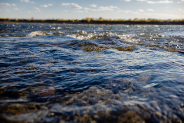 Quiet river water in the evening light  background