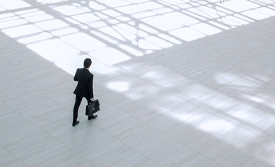 top view from afar.Executive businessman with portfolio