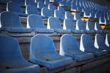 rows of empty seats in stadium