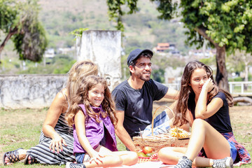 Family interacting on a sunny day outdoors