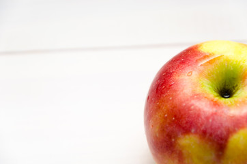 Close-up of red apple on white background