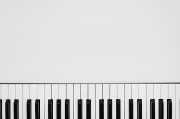 Piano keys on white background