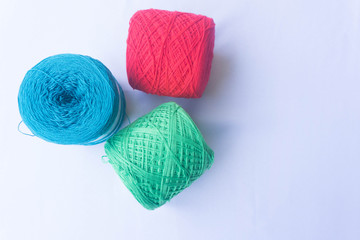Three color of yarn with white background