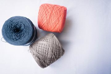 Three color of yarn with white background