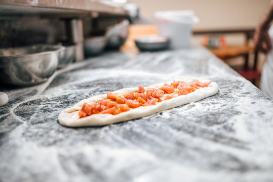 Delicious raw macedonian pizza. Close-up.